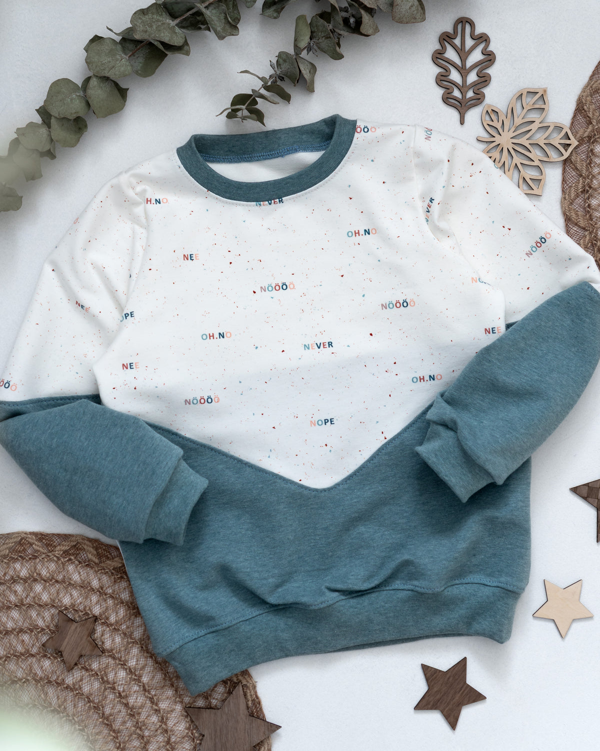 Zweigeteilter Sweater mit/ohne Kapuze